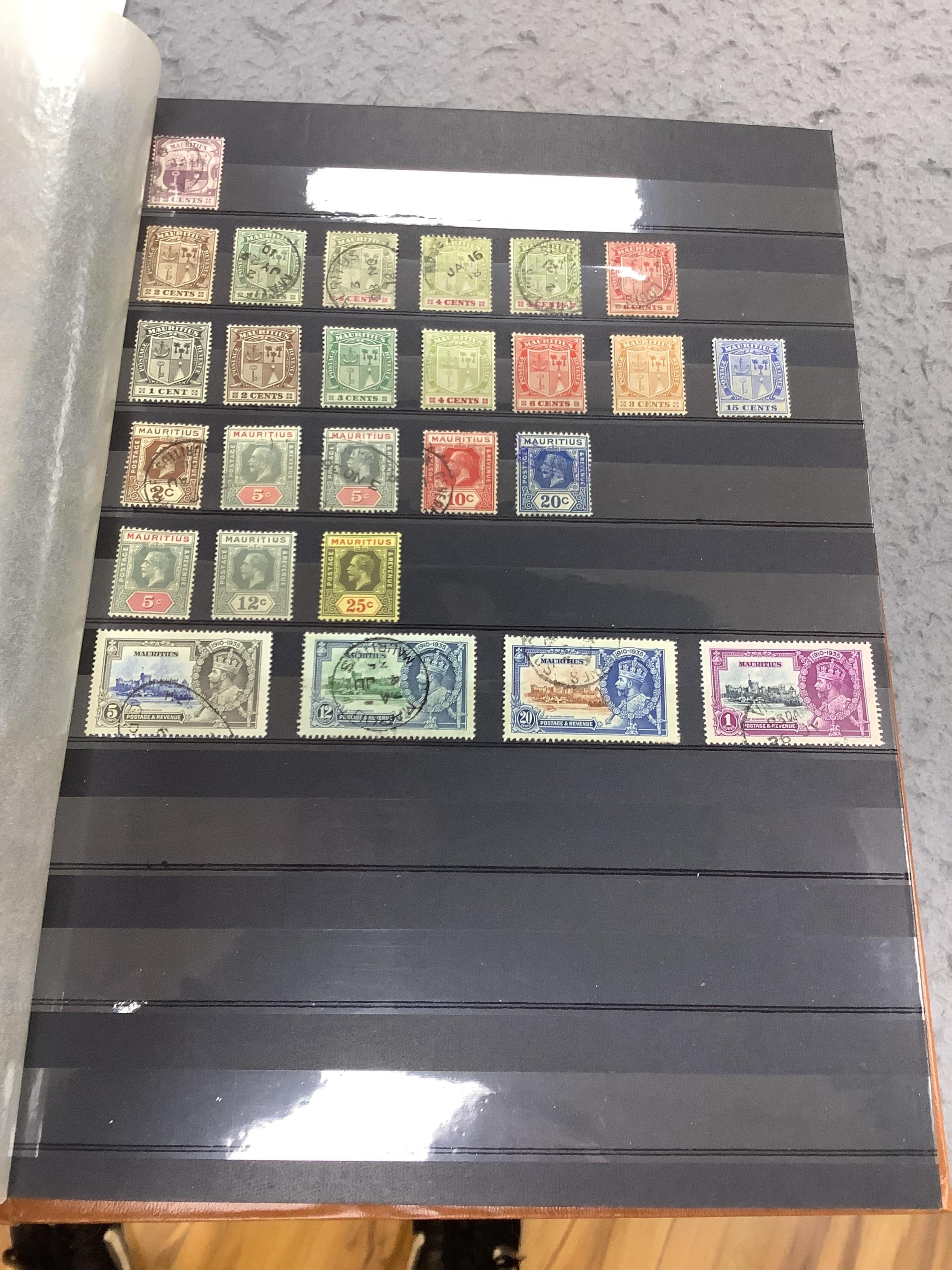 Four albums of stamps: Newfoundland, Jamaica etc (4). Condition - mostly stamp marked